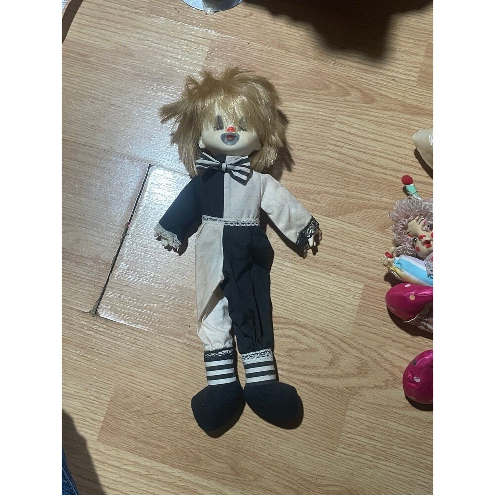 Creepy vintage clown doll